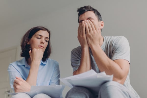 Couple are stressed about finance when emergency appears