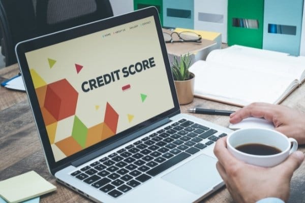 Words “Credit Score” showing on a laptop screen