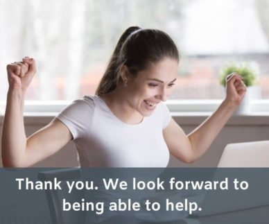happy customer looking at laptop