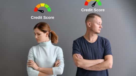 Couple with good and bad credit score turning against each other.